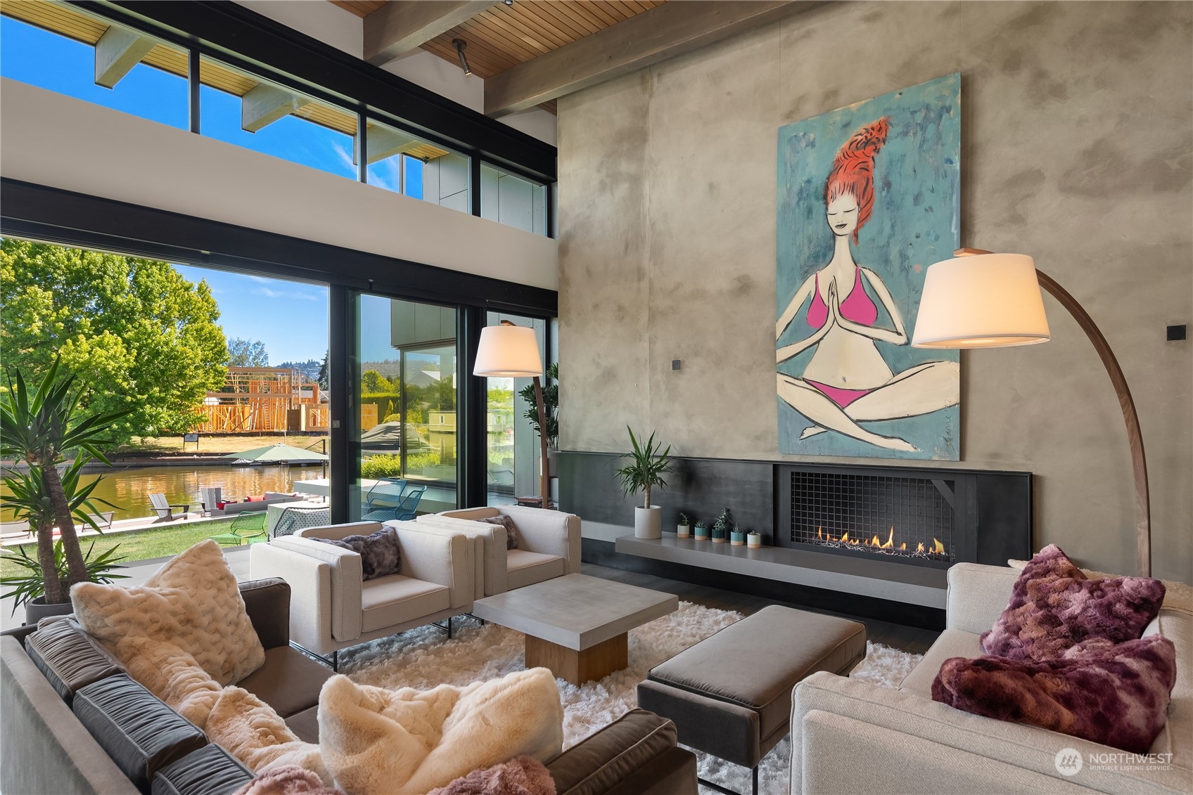 85 Cascade Key Bellevue, WA 98006 - Photo 5 of 37 a living room with furniture fireplace and a large window