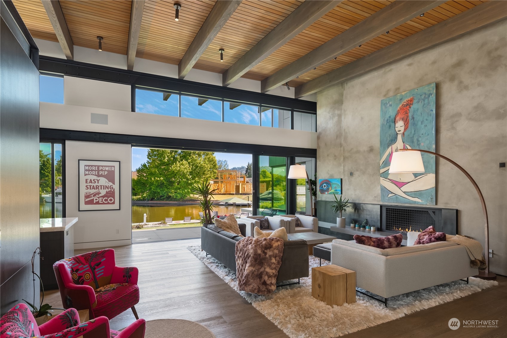 85 Cascade Key Bellevue, WA 98006 - Photo 8 of 37 a living room with fireplace furniture and a large window