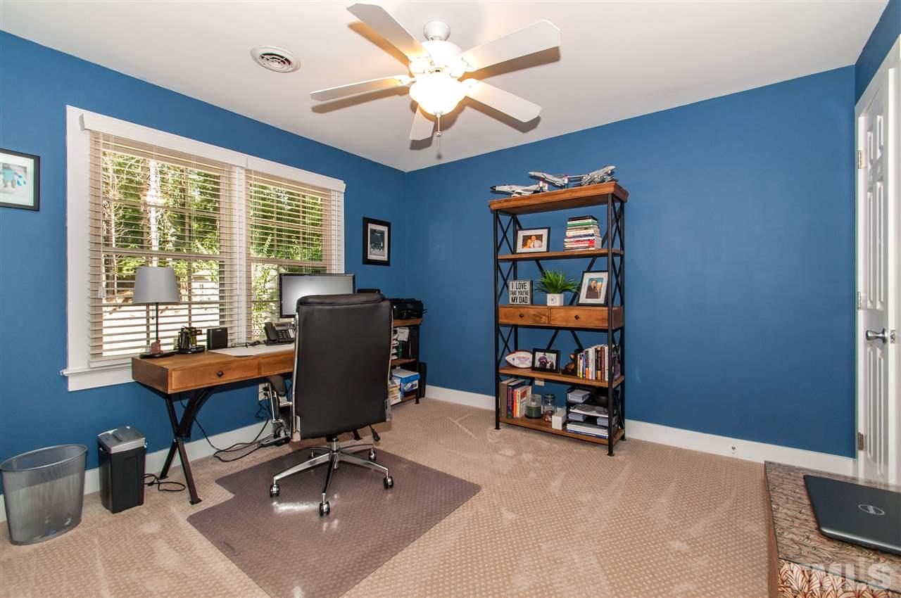 11905 Deer Run Raleigh, NC 27614 - Photo 14 of 25 a workspace with a bookshelf
