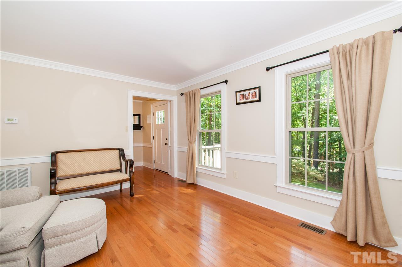 11905 Deer Run Raleigh, NC 27614 - Photo 7 of 25 a living room with furniture and a window