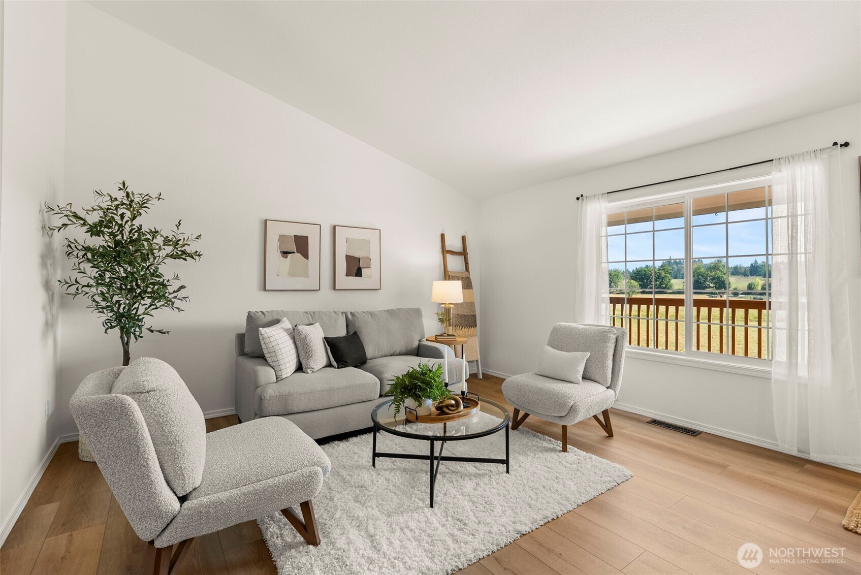 12225 Case Road Southwest Olympia, WA 98512 - Photo 11 of 40 a living room with furniture a window and a potted plant