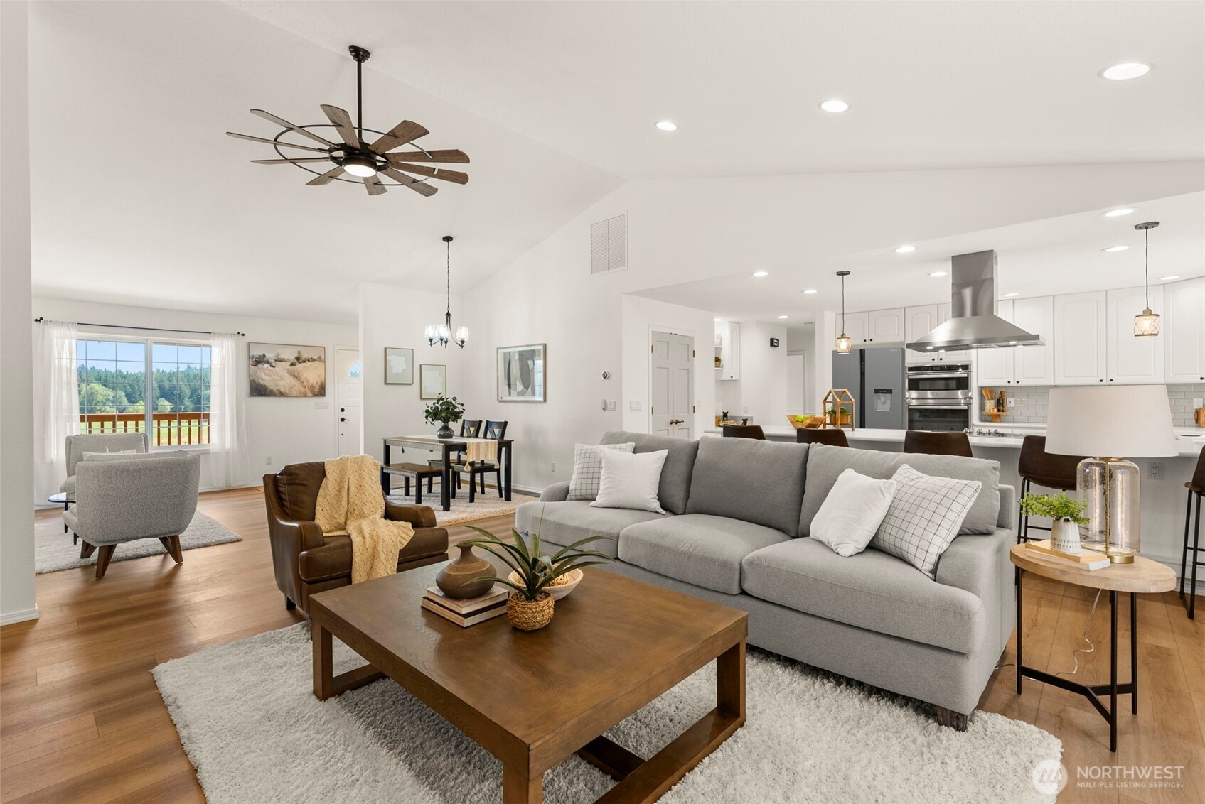12225 Case Road Southwest Olympia, WA 98512 - Photo 13 of 40 a living room with furniture and kitchen view