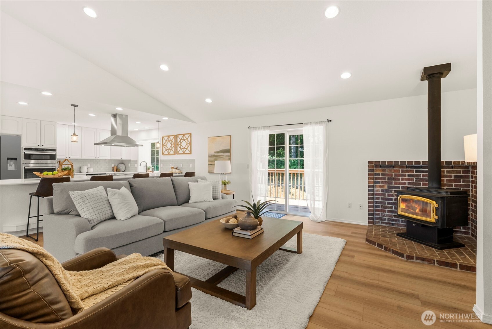 12225 Case Road Southwest Olympia, WA 98512 - Photo 14 of 40 a living room with furniture and a fireplace