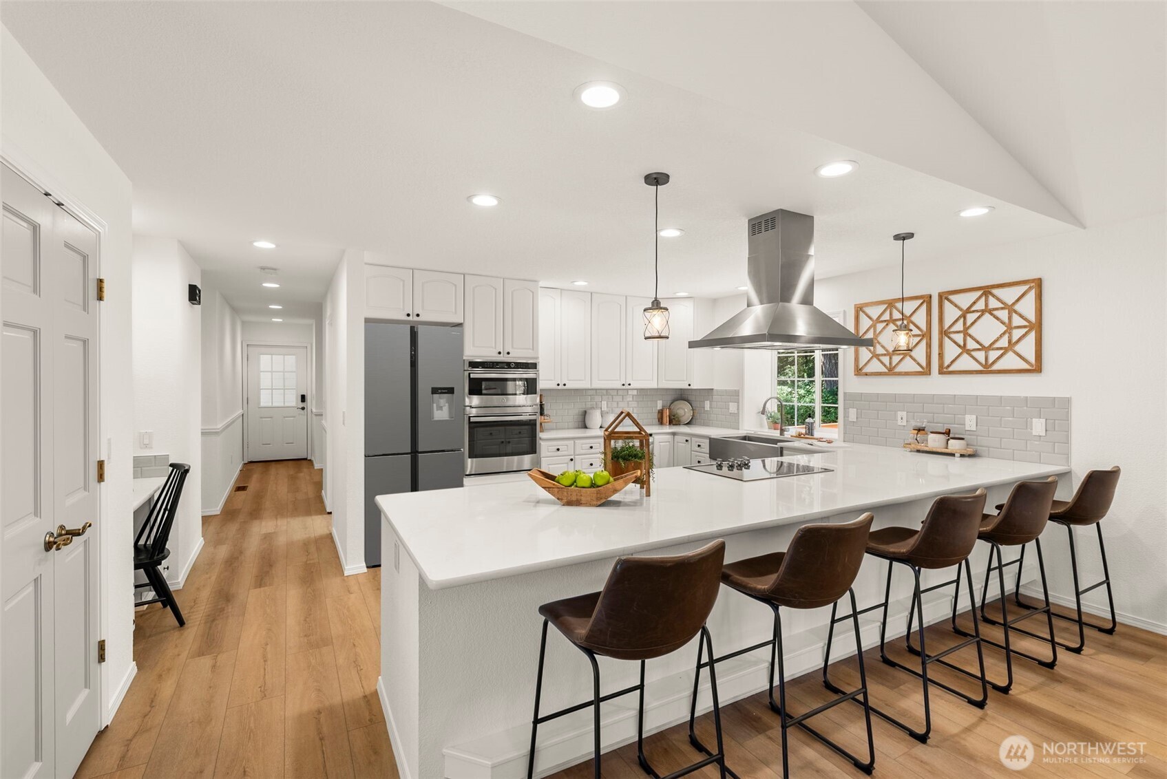 12225 Case Road Southwest Olympia, WA 98512 - Photo 15 of 40 a large kitchen with a table and chairs