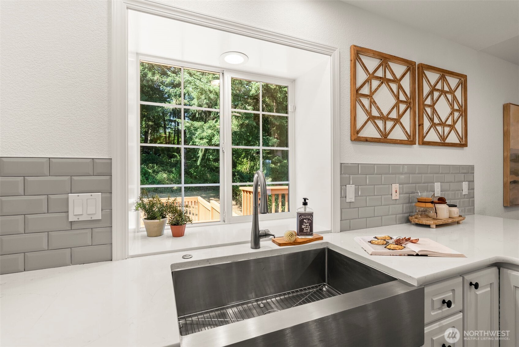 12225 Case Road Southwest Olympia, WA 98512 - Photo 17 of 40 a kitchen with a stove and a sink