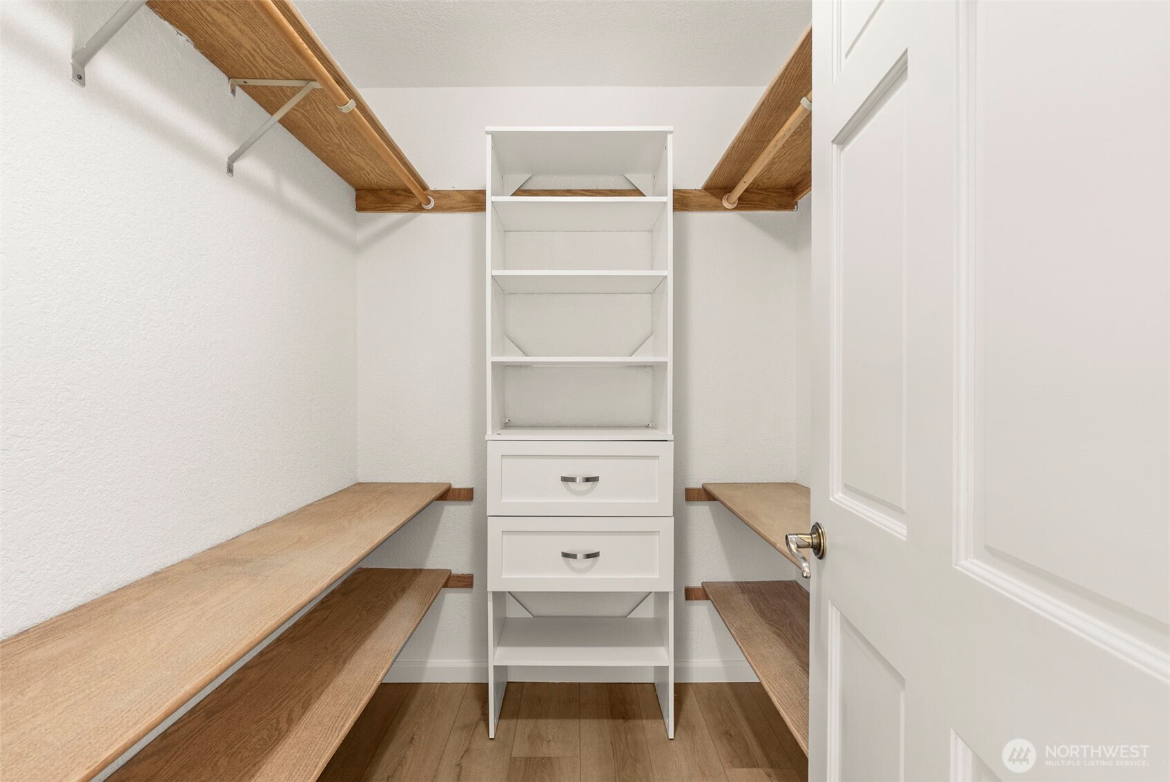 12225 Case Road Southwest Olympia, WA 98512 - Photo 25 of 40 a view of walk in closet with empty racks