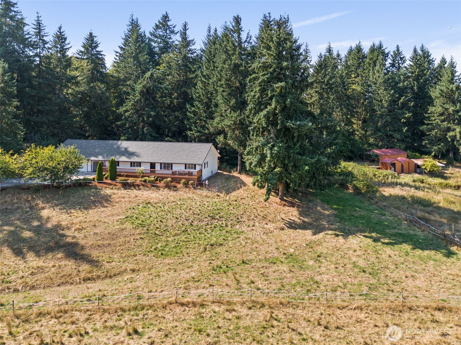 12225 Case Road Southwest Olympia, WA 98512 - Photo 3 of 40 a view of a water with a house in the background