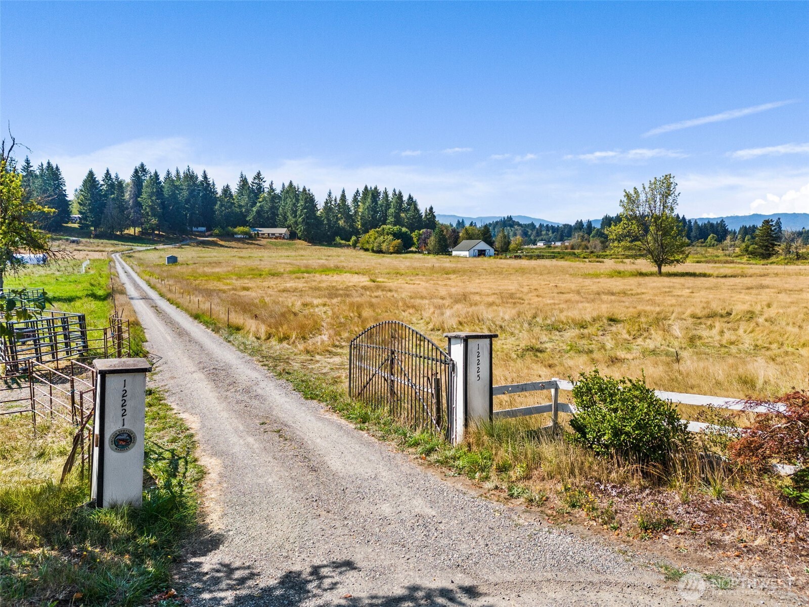 12225 Case Road Southwest Olympia, WA 98512 - Photo 5 of 40 a view of an ocean with a table and chairs