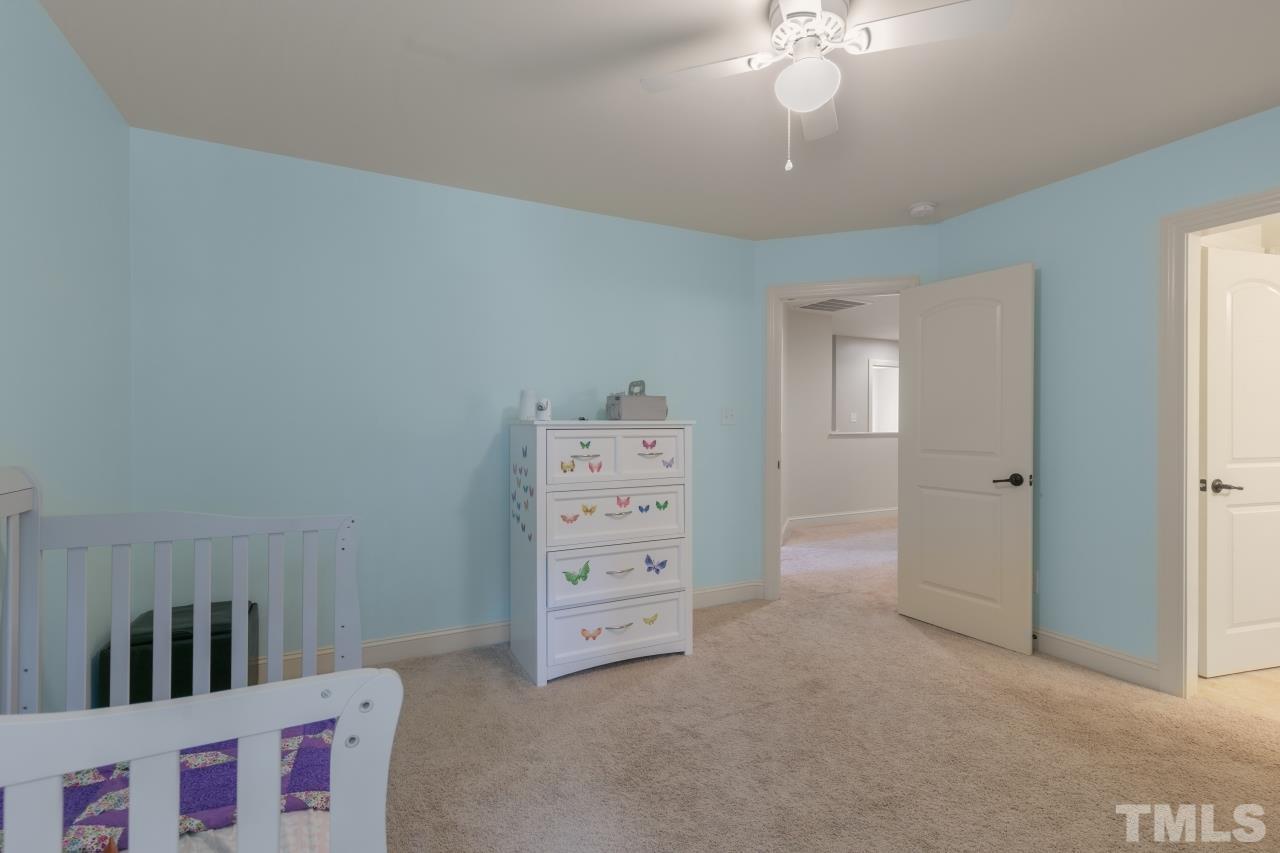 558 Fontana Drive Clayton, NC 27527 - Photo 28 of 41 a view of room with cabinet and ceiling fan