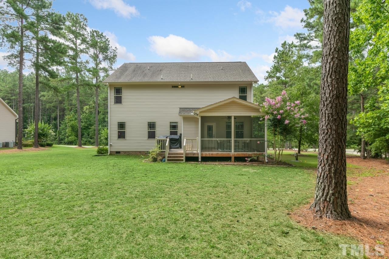 558 Fontana Drive Clayton, NC 27527 - Photo 38 of 41 a view of a house with a backyard