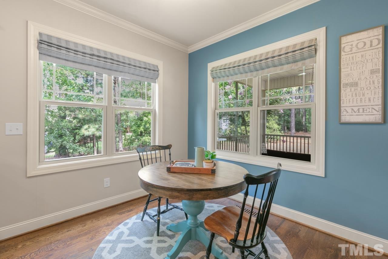 558 Fontana Drive Clayton, NC 27527 - Photo 7 of 41 a view of a dining room with tables and chairs