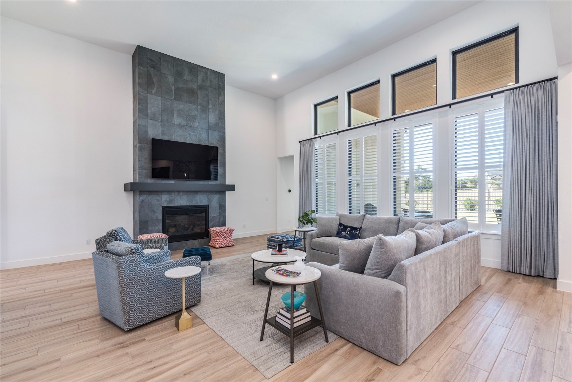 108 Gaucho Way Dripping Springs, TX 78620 - Photo 8 of 39 Living Room with gas fireplace