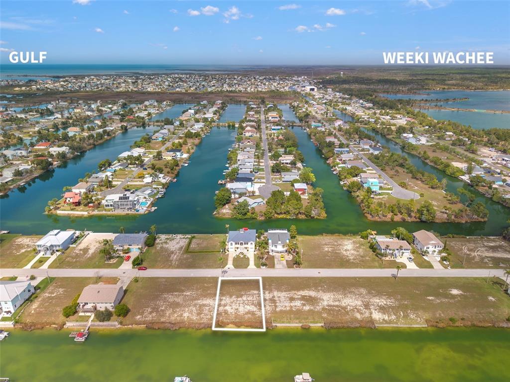 4018 Amberjack Drive Hernando Beach, FL 34607 - Photo 4 of 9 a view of an ocean and a building