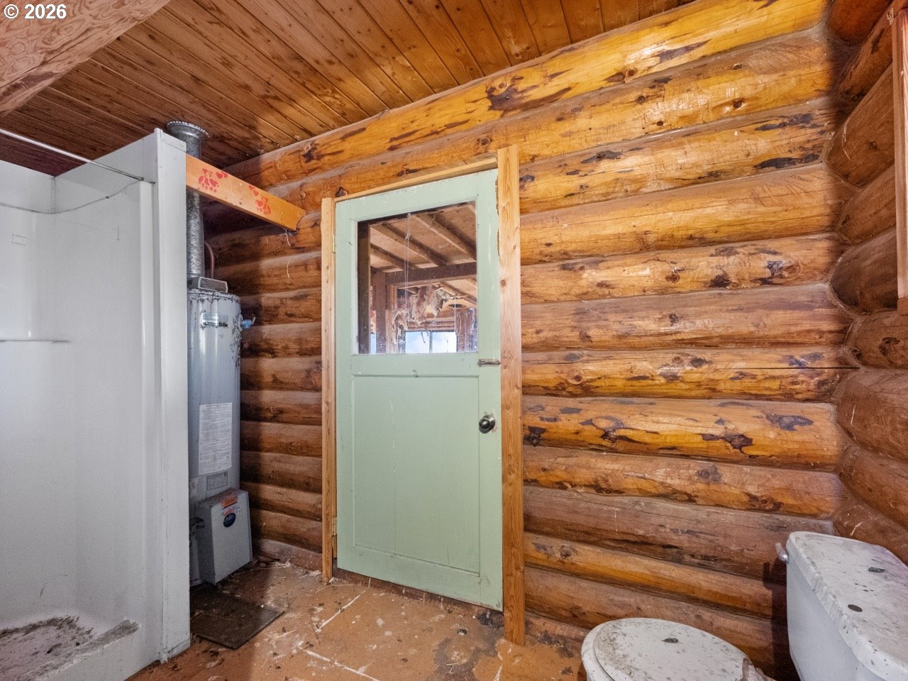 Roulet Loop Elgin, OR 97827 - Photo 9 of 14 a bathroom with a toilet and a shower