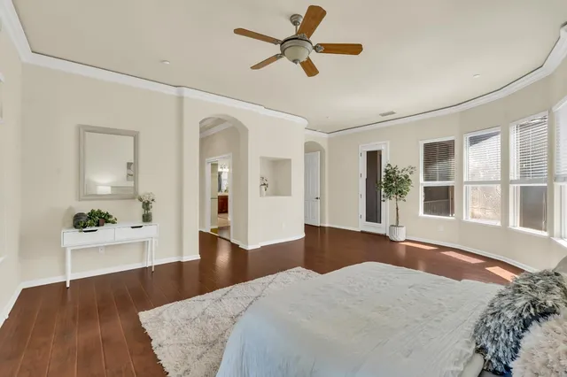 a lobby with furniture and floor to ceiling window