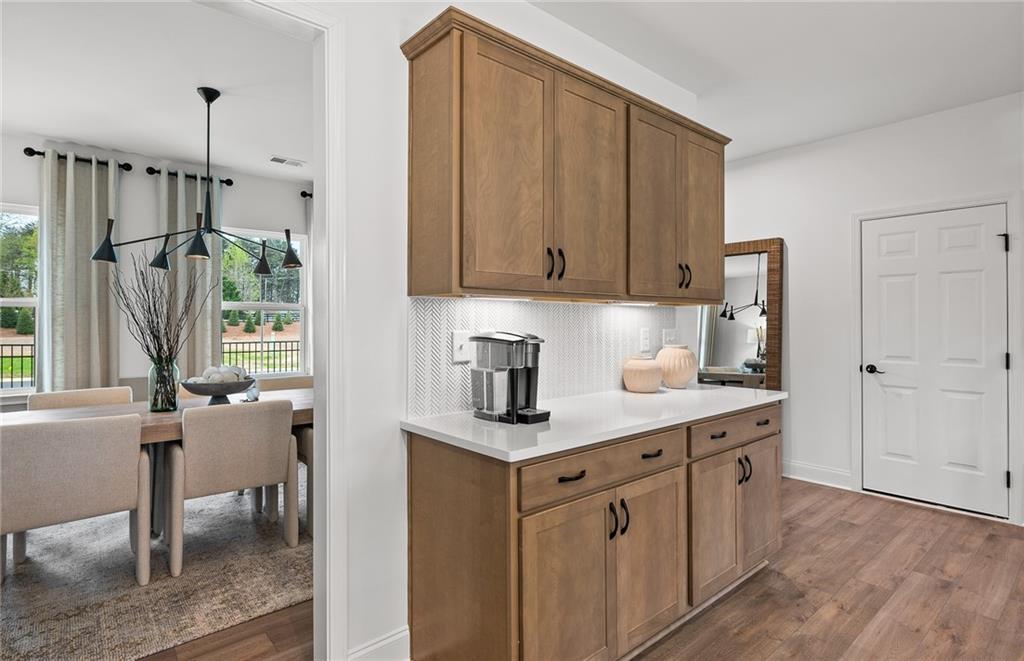 808 Tupelo Way Villa Rica, GA 30180 - Photo 17 of 48 a kitchen with a sink cabinets and window