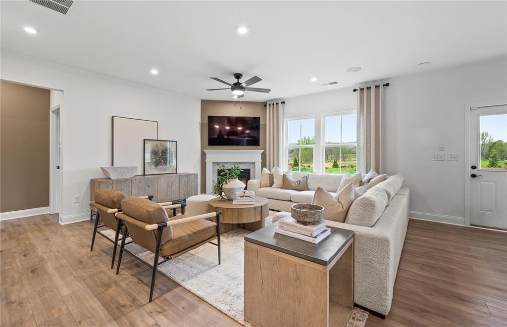 808 Tupelo Way Villa Rica, GA 30180 - Photo 22 of 48 a living room with furniture and a flat screen tv