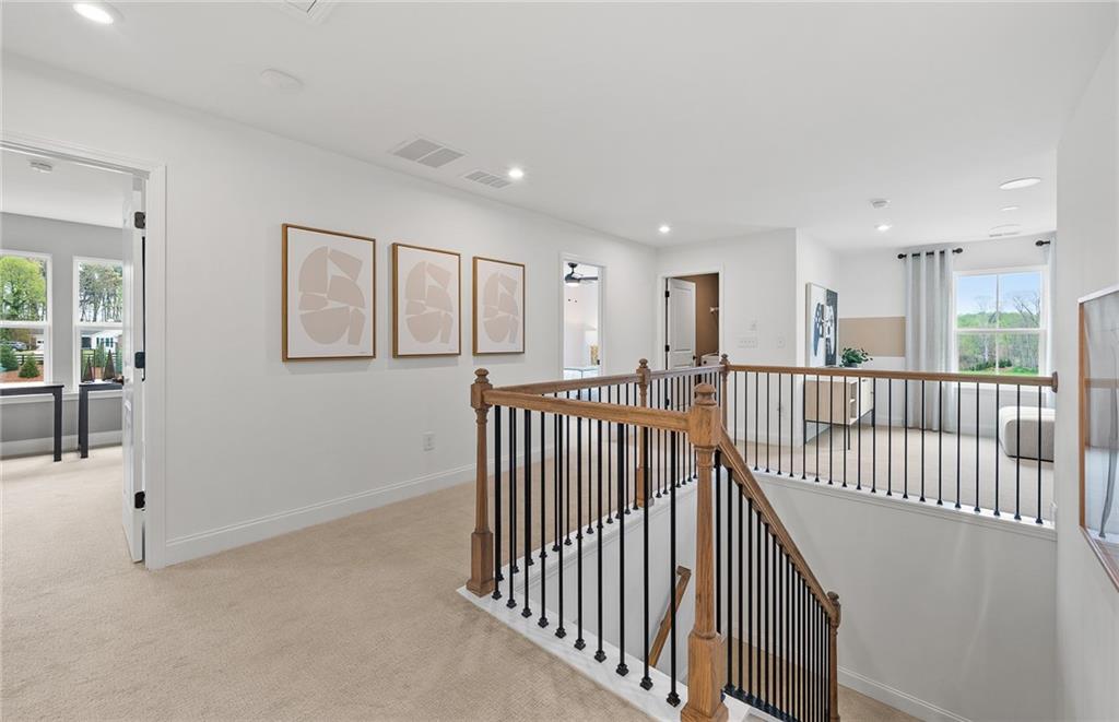 808 Tupelo Way Villa Rica, GA 30180 - Photo 28 of 48 a view of a hallway with windows