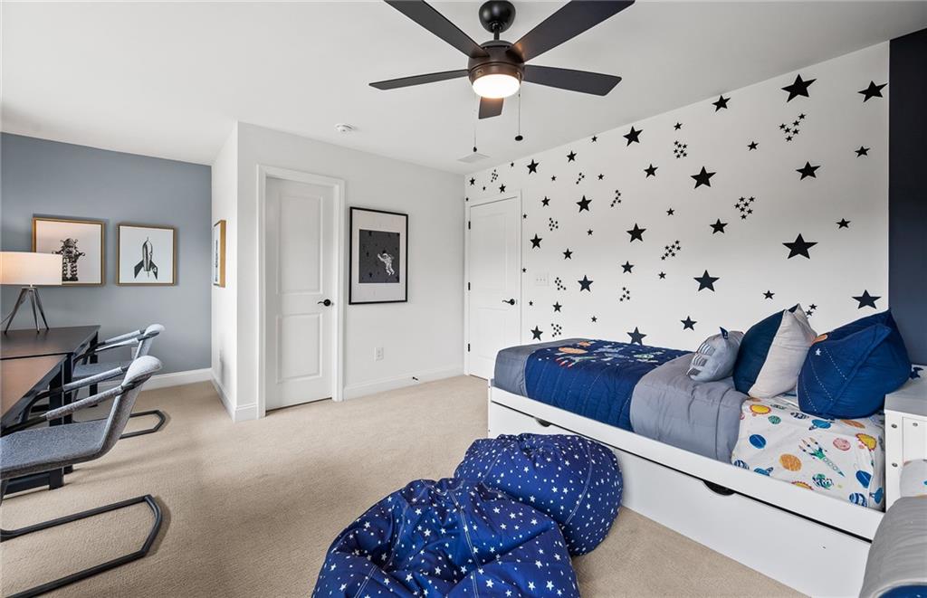 808 Tupelo Way Villa Rica, GA 30180 - Photo 38 of 48 a living room with furniture and a couch