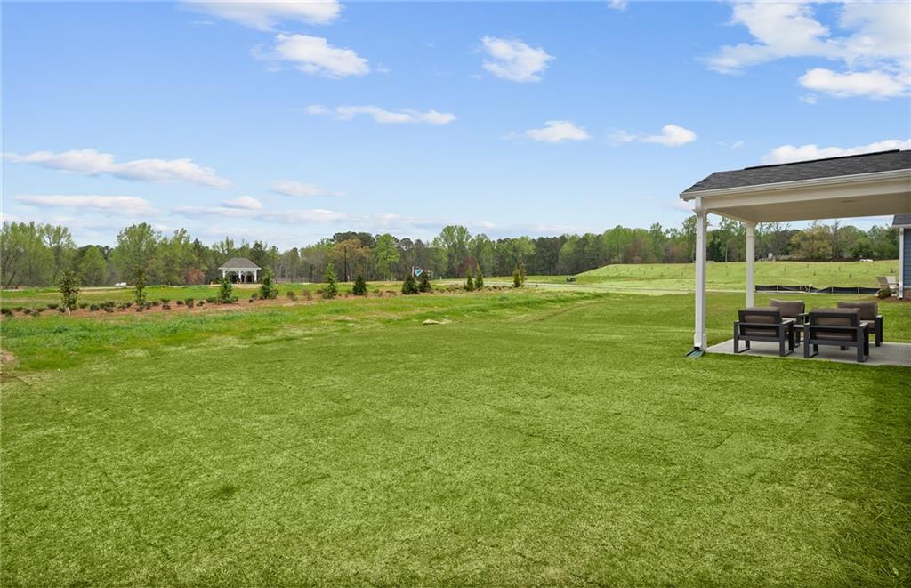 808 Tupelo Way Villa Rica, GA 30180 - Photo 48 of 48 a view of a golf course with a lake
