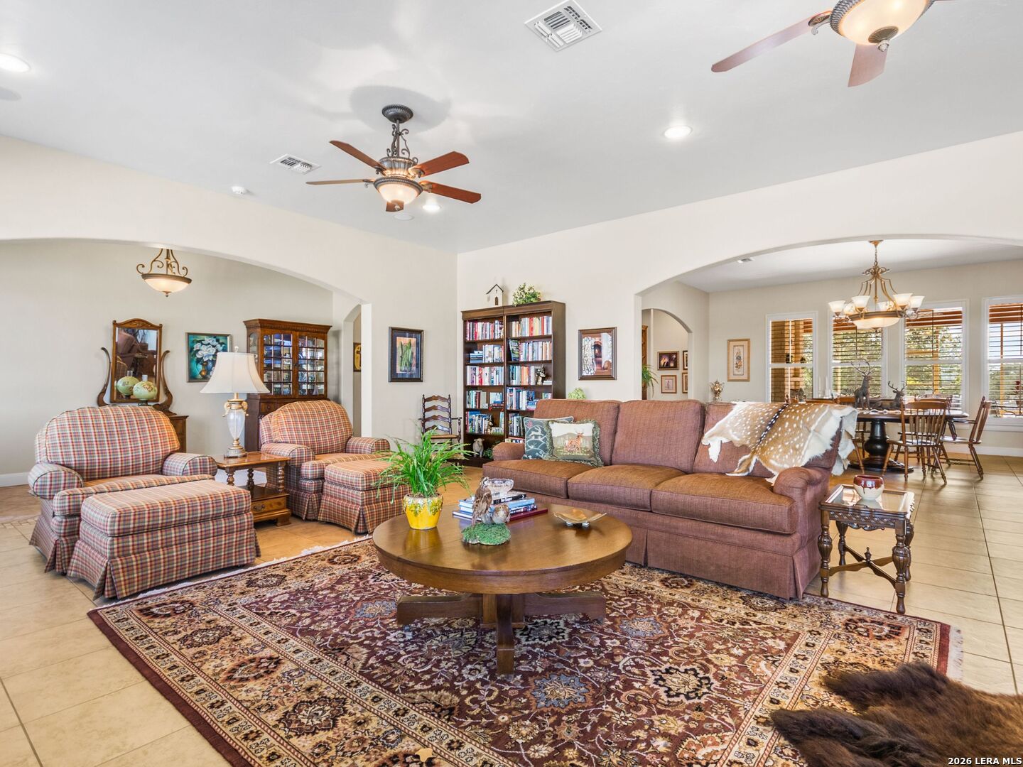 1000 Landmark Kerrville, TX 78028 - Photo 12 of 71 a living room with furniture and a chandelier