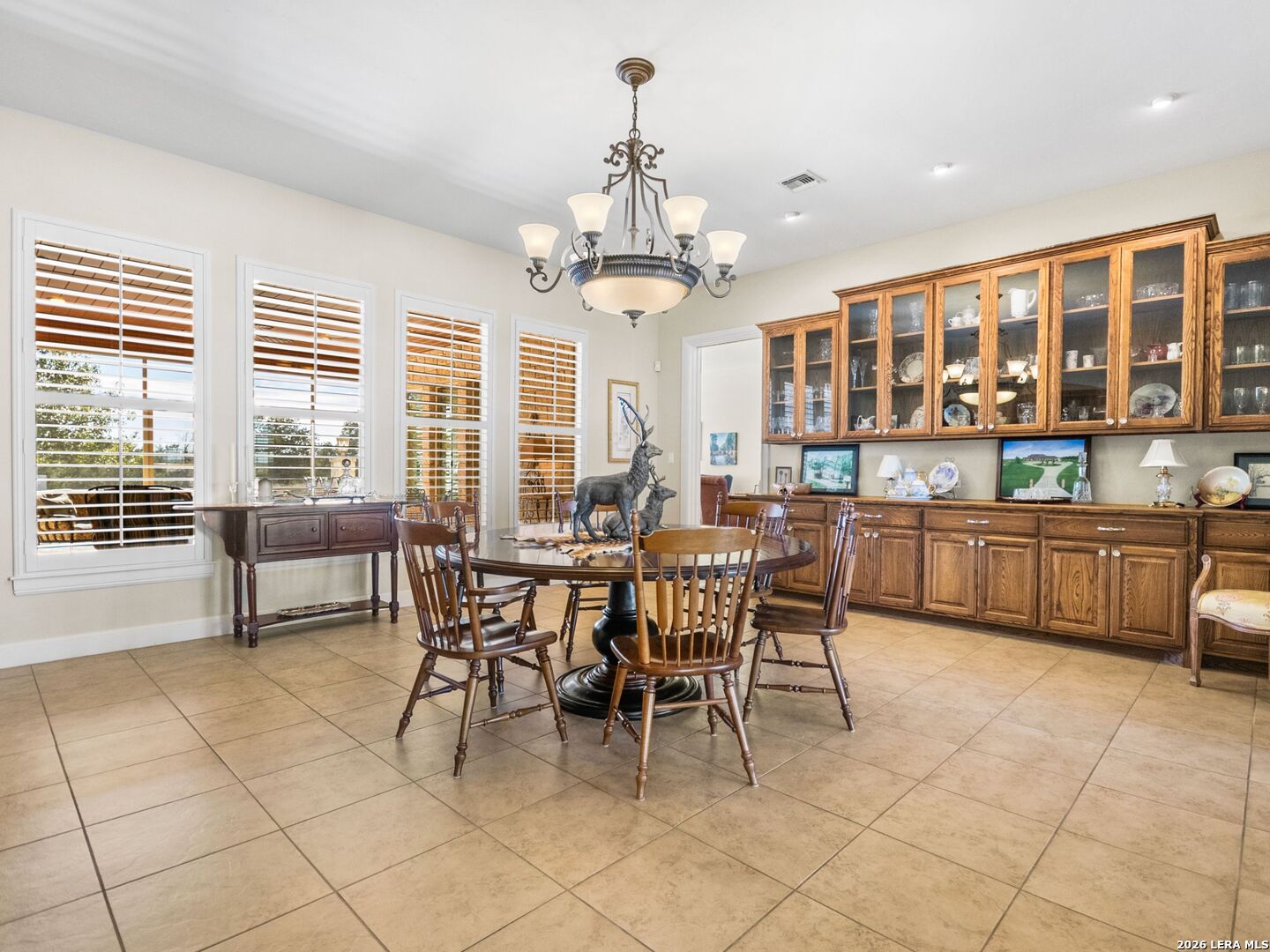 1000 Landmark Kerrville, TX 78028 - Photo 15 of 71 a view of a dining room with furniture and a chandelier