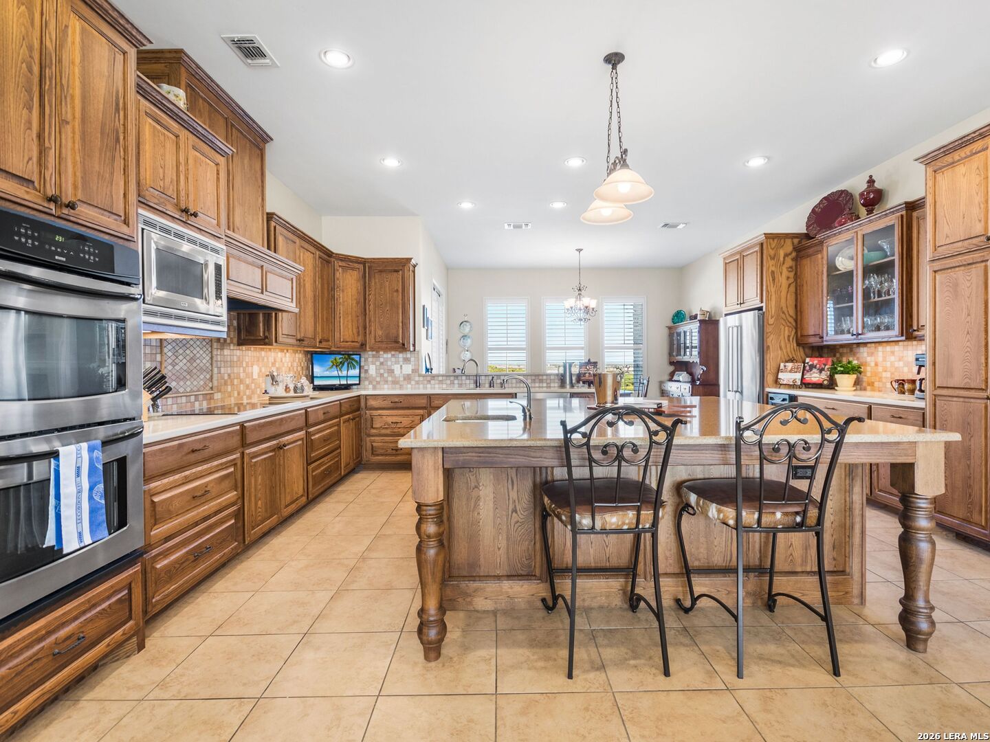 1000 Landmark Kerrville, TX 78028 - Photo 21 of 71 a large kitchen with a table and chairs