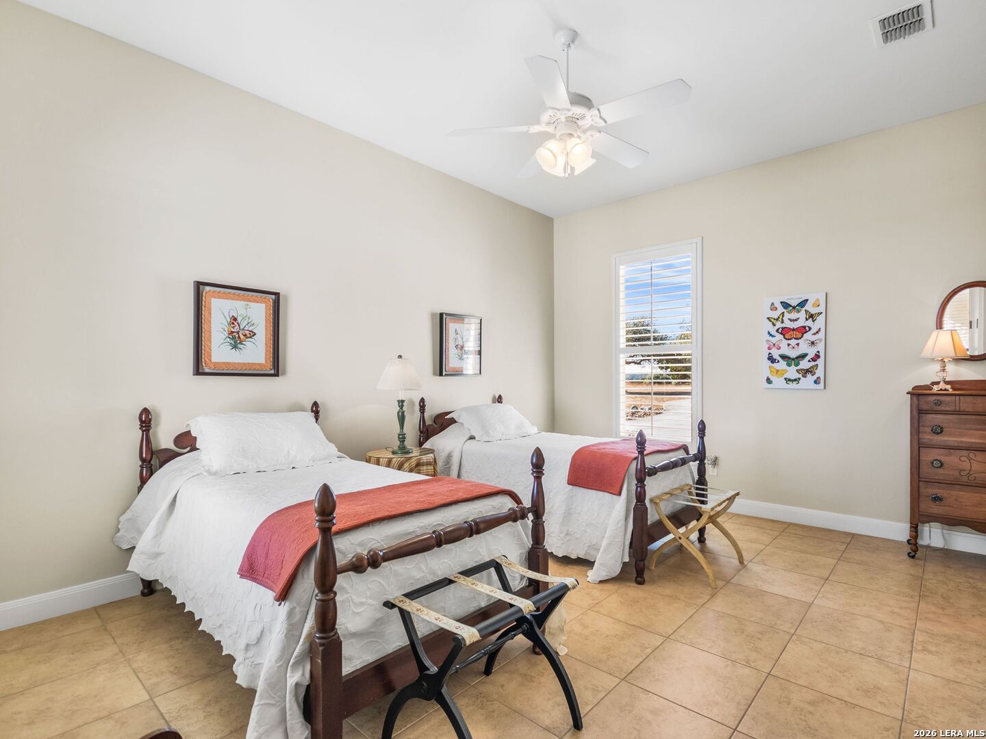 1000 Landmark Kerrville, TX 78028 - Photo 40 of 71 a bedroom with a bed and a chandelier