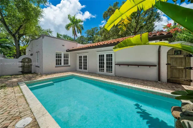 a house view with a garden space