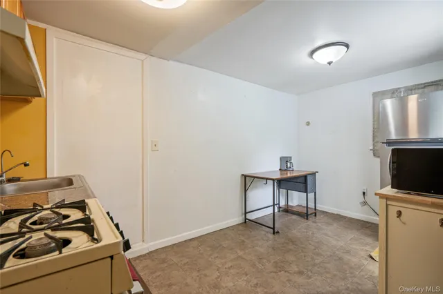 a room with furniture and a flat screen tv