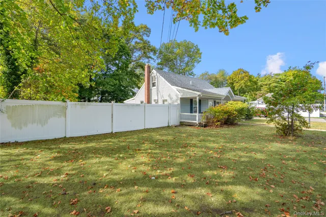 a house with a tree in front of it