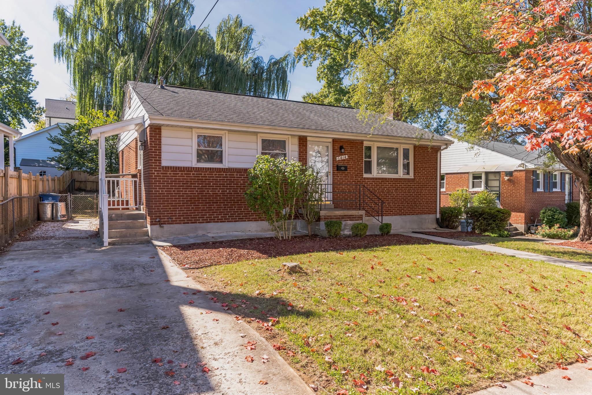 6414 Winnepeg Road Bethesda, MD 20817 - Photo 1 of 20 a view of a house with swimming pool in front of it