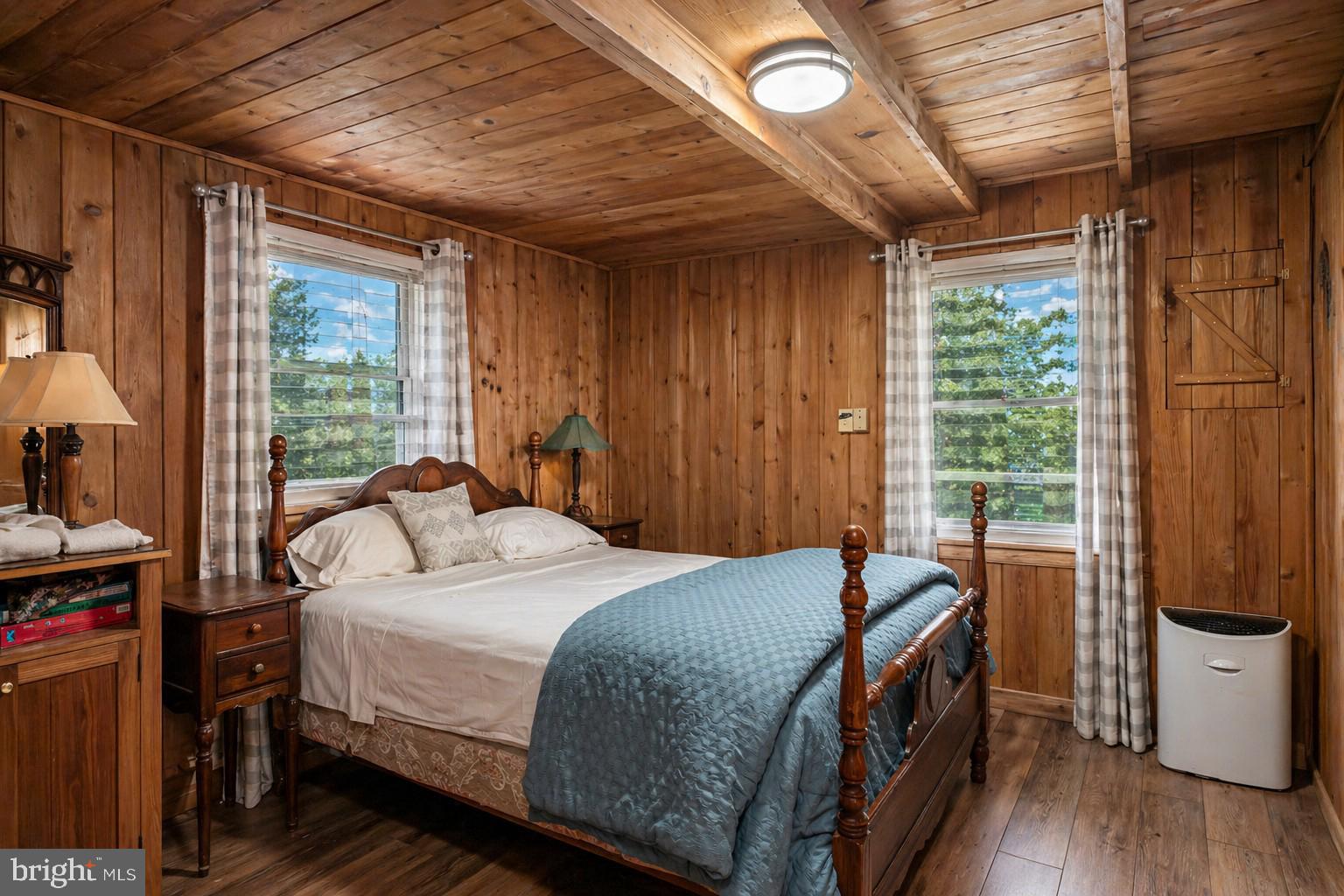 2187 State Park Road Swanton, MD 21561 - Photo 19 of 29 a bedroom with a bed and a window