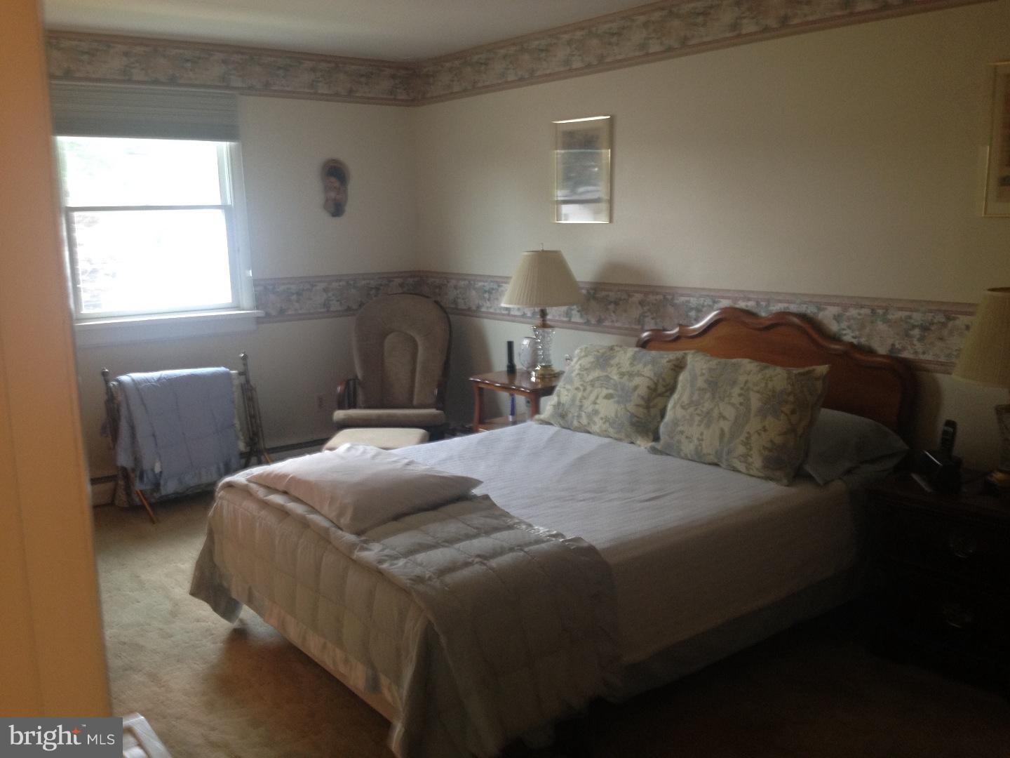 13037 Worthington Road Philadelphia, PA 19116 - Photo 11 of 15 a bedroom with a bed and window