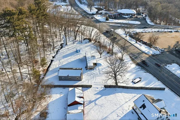a view of house with a yard