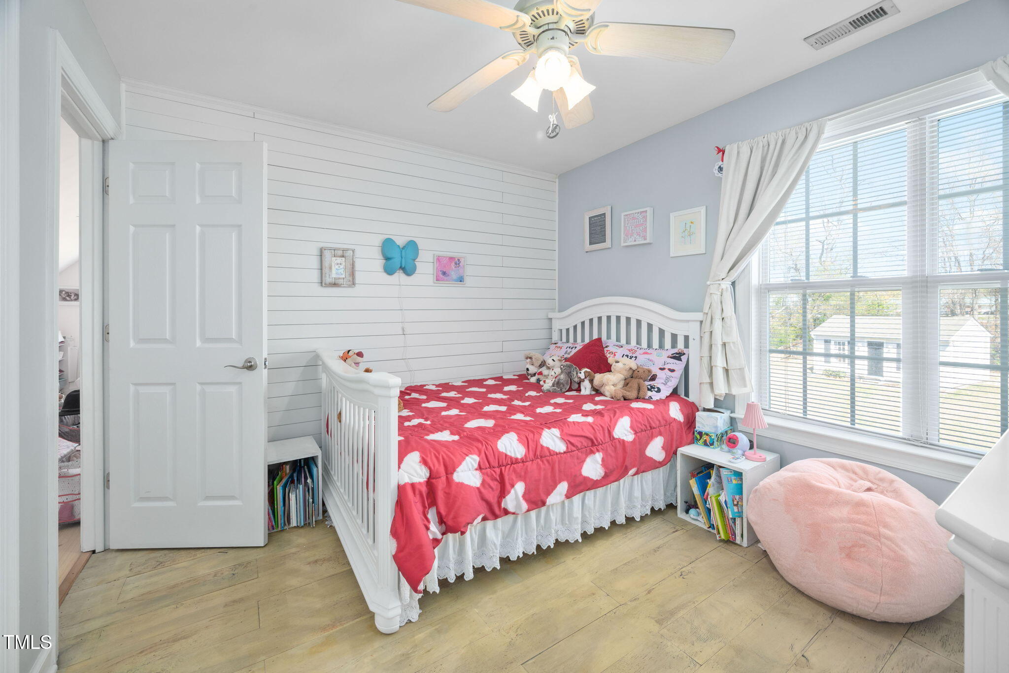 Undisclosed Address Garner, NC 27529 - Photo 20 of 35 a bedroom with a bed and a window