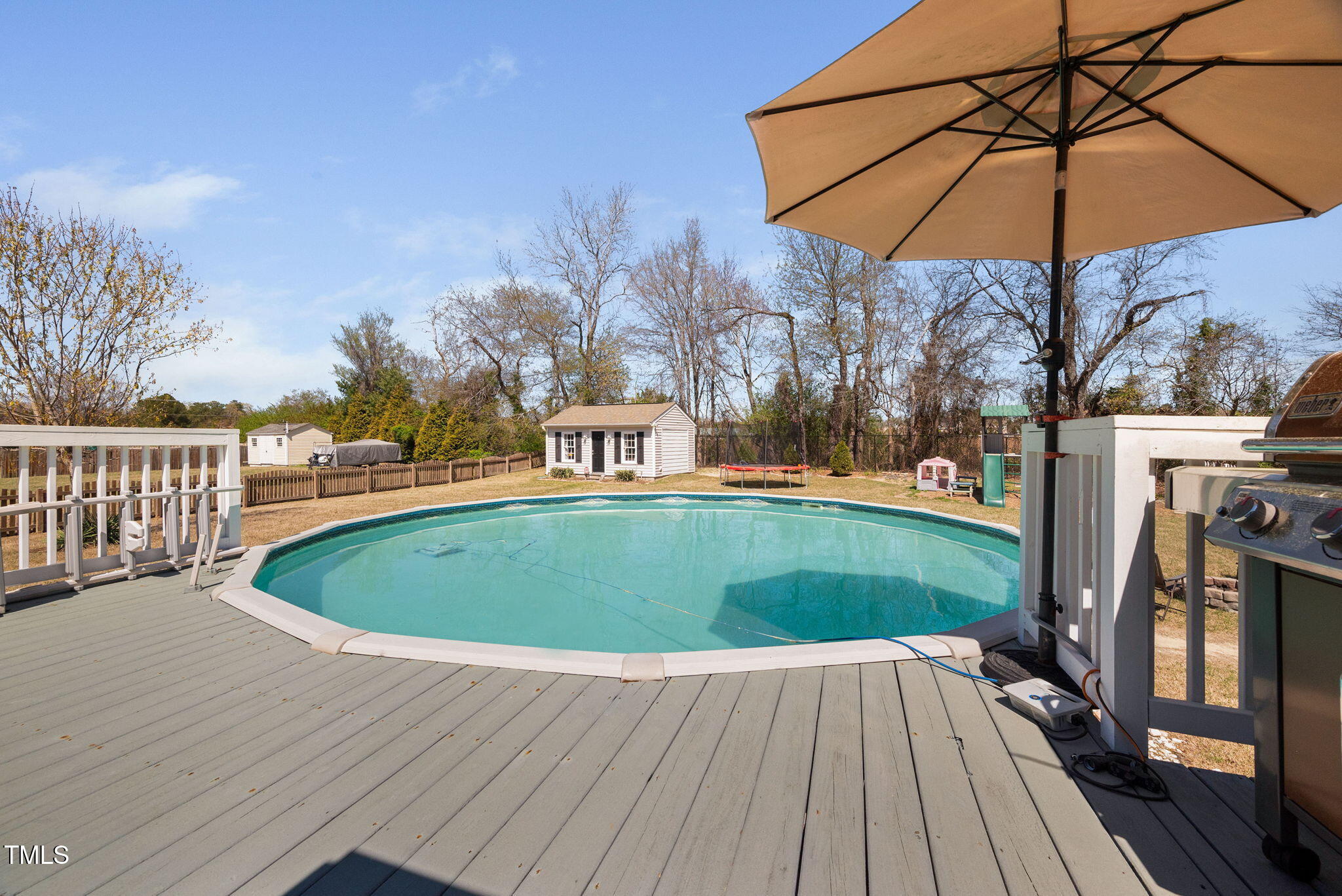 Undisclosed Address Garner, NC 27529 - Photo 27 of 35 a view of outdoor space deck and outdoor kitchen