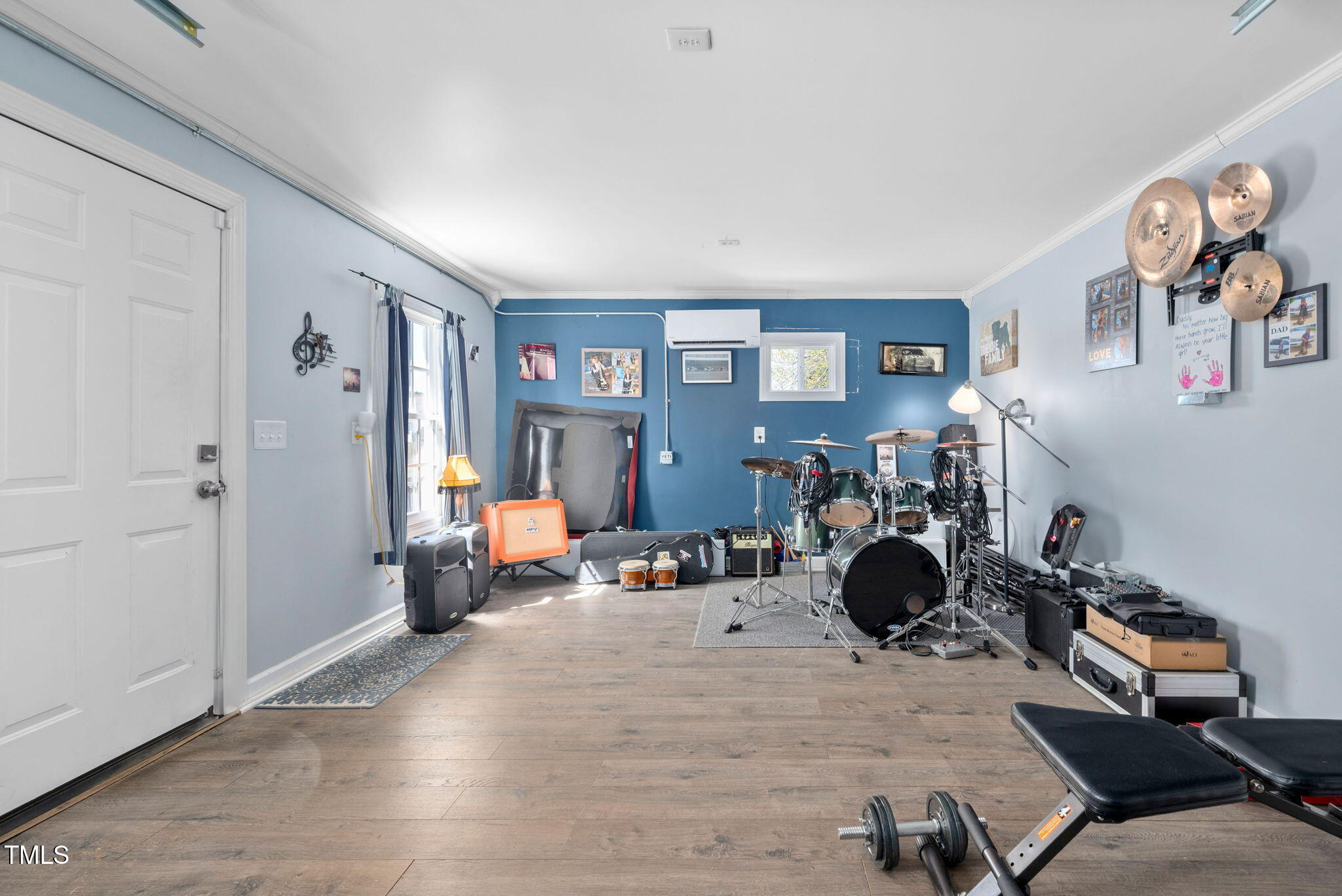 Undisclosed Address Garner, NC 27529 - Photo 32 of 35 a room with furniture a rug and a window