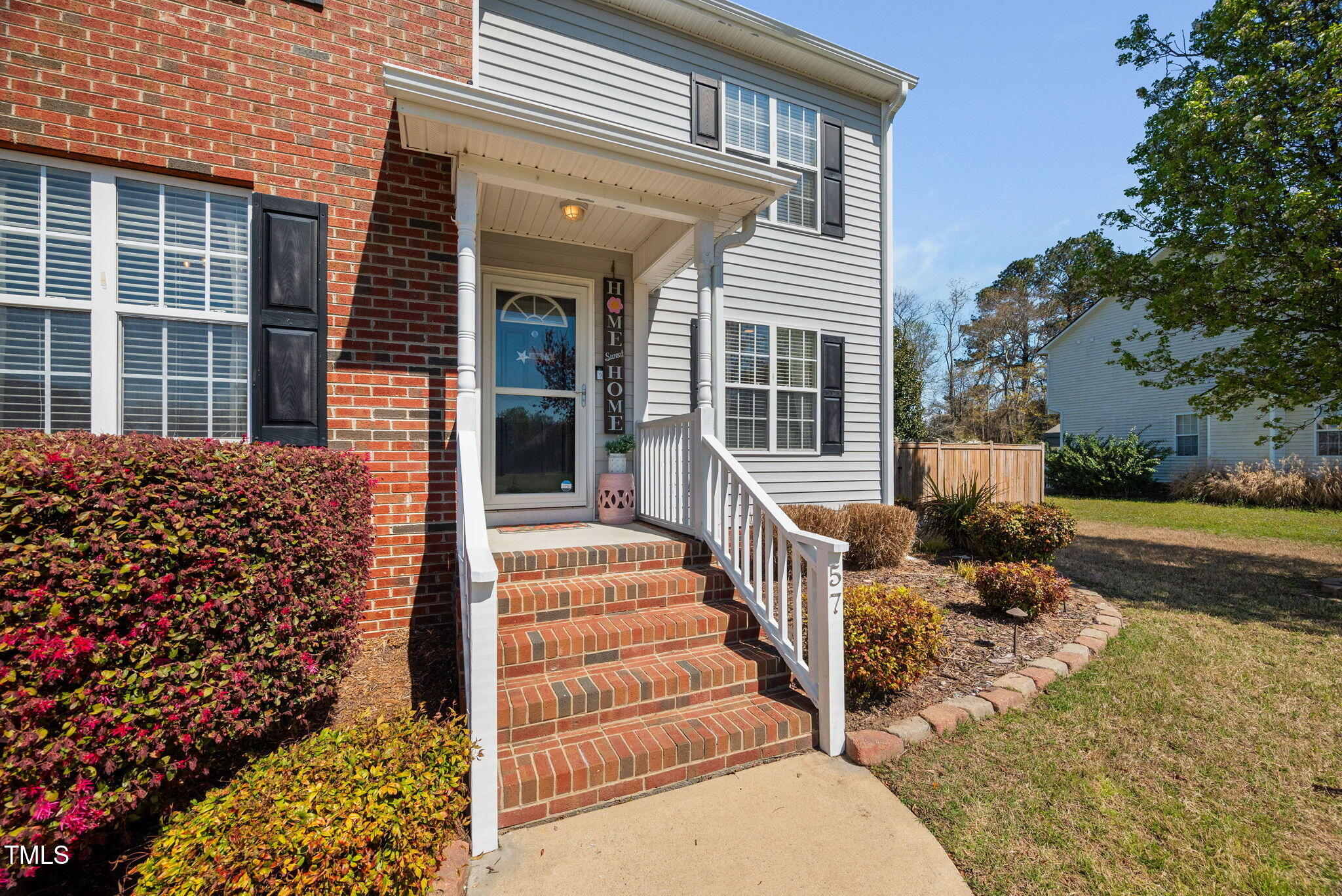 Undisclosed Address Garner, NC 27529 - Photo 3 of 35 front view of a house with a yard
