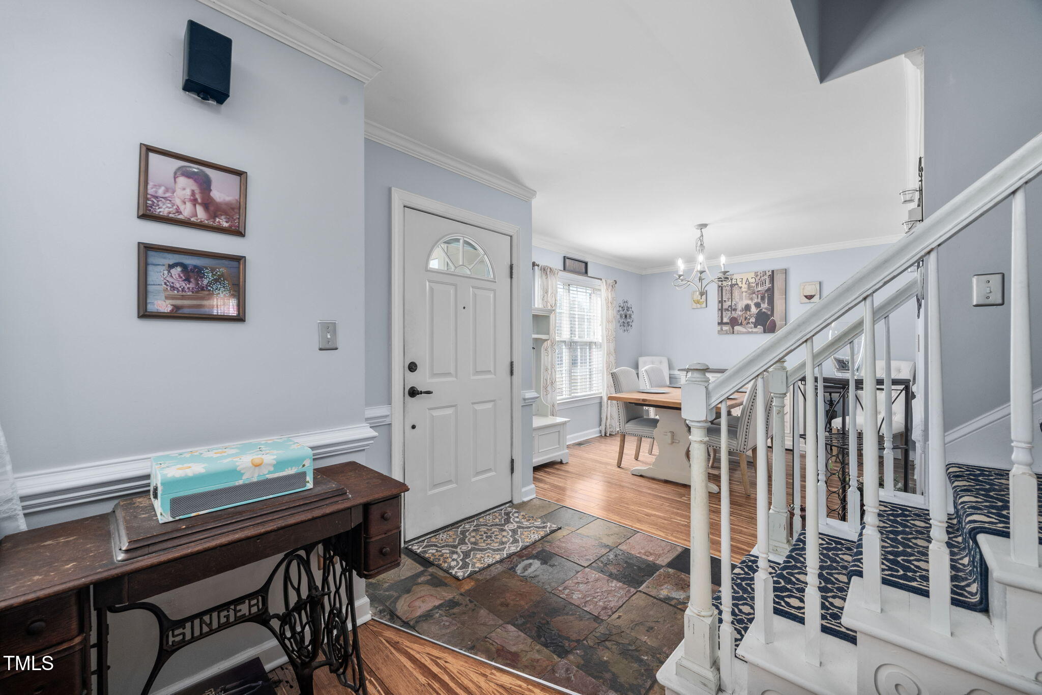 Undisclosed Address Garner, NC 27529 - Photo 8 of 35 a livingroom with furniture and a dining table