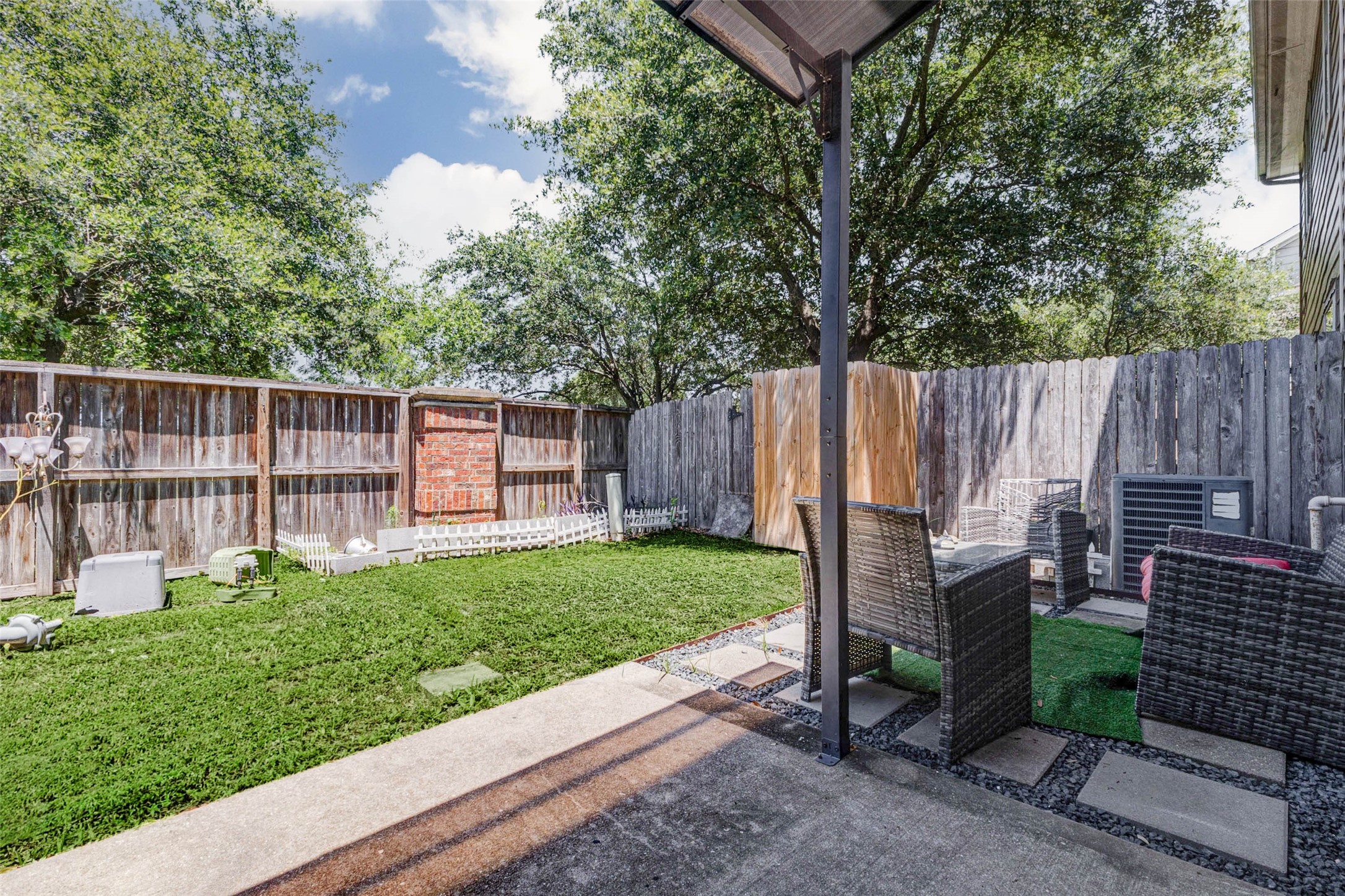 14522 Durham Chase Lane Houston, TX 77095 - Photo 31 of 40 a view of a backyard with a garden and deck