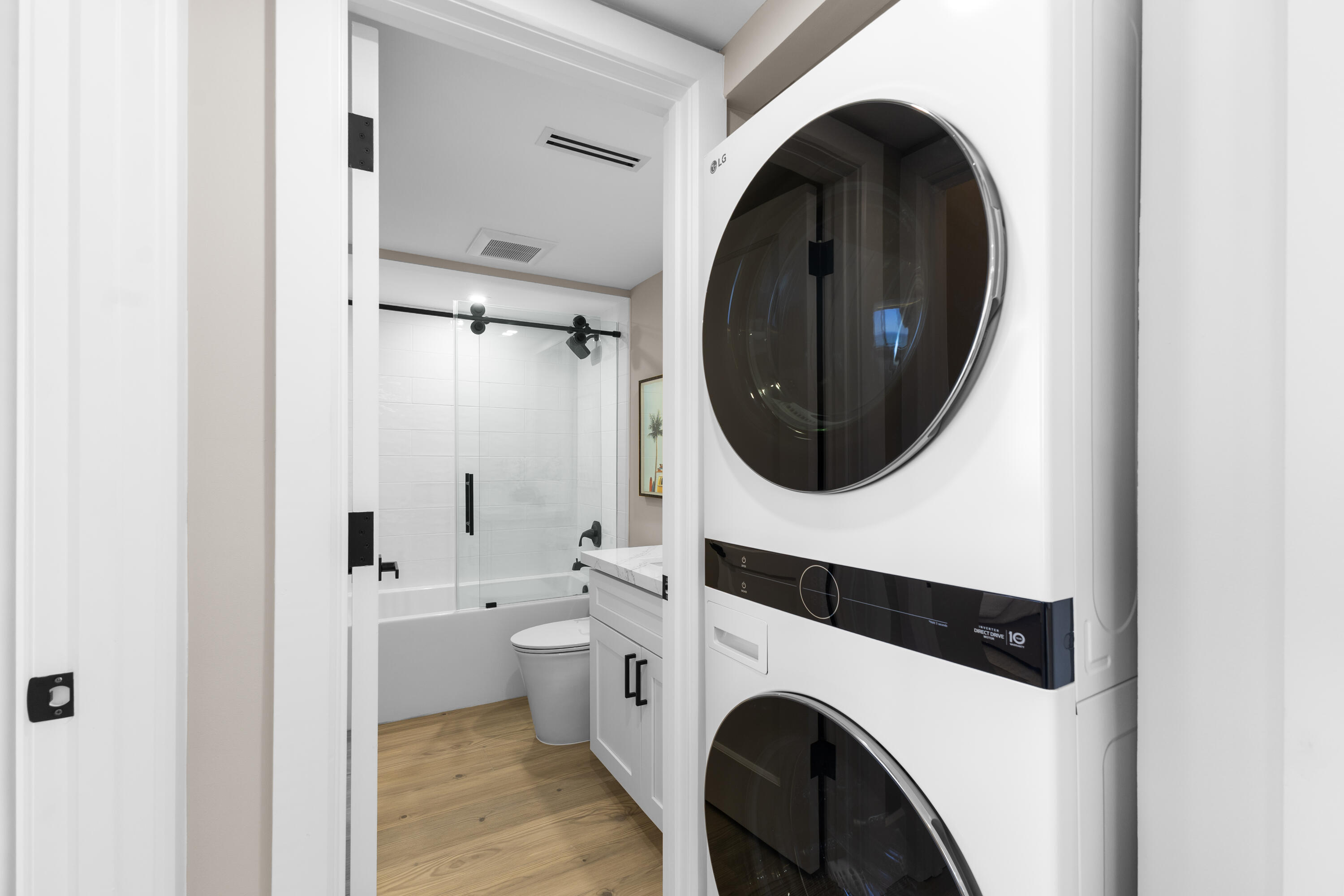 400 Ocean Trail Way, Unit 1008 Jupiter, FL 33477 - Photo 19 of 25 a utility room with dryer and washer