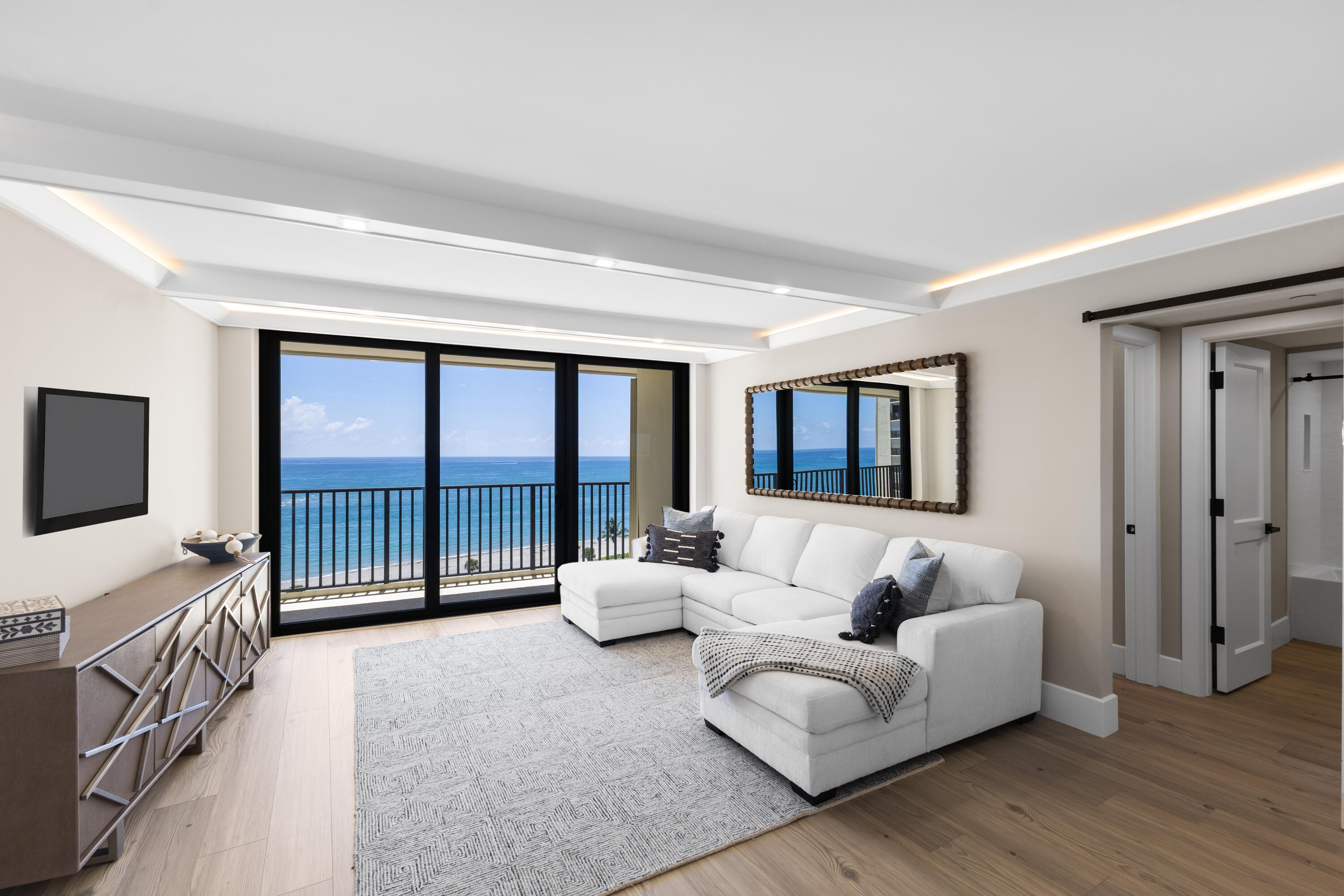 400 Ocean Trail Way, Unit 1008 Jupiter, FL 33477 - Photo 2 of 25 a bedroom with furniture and large window