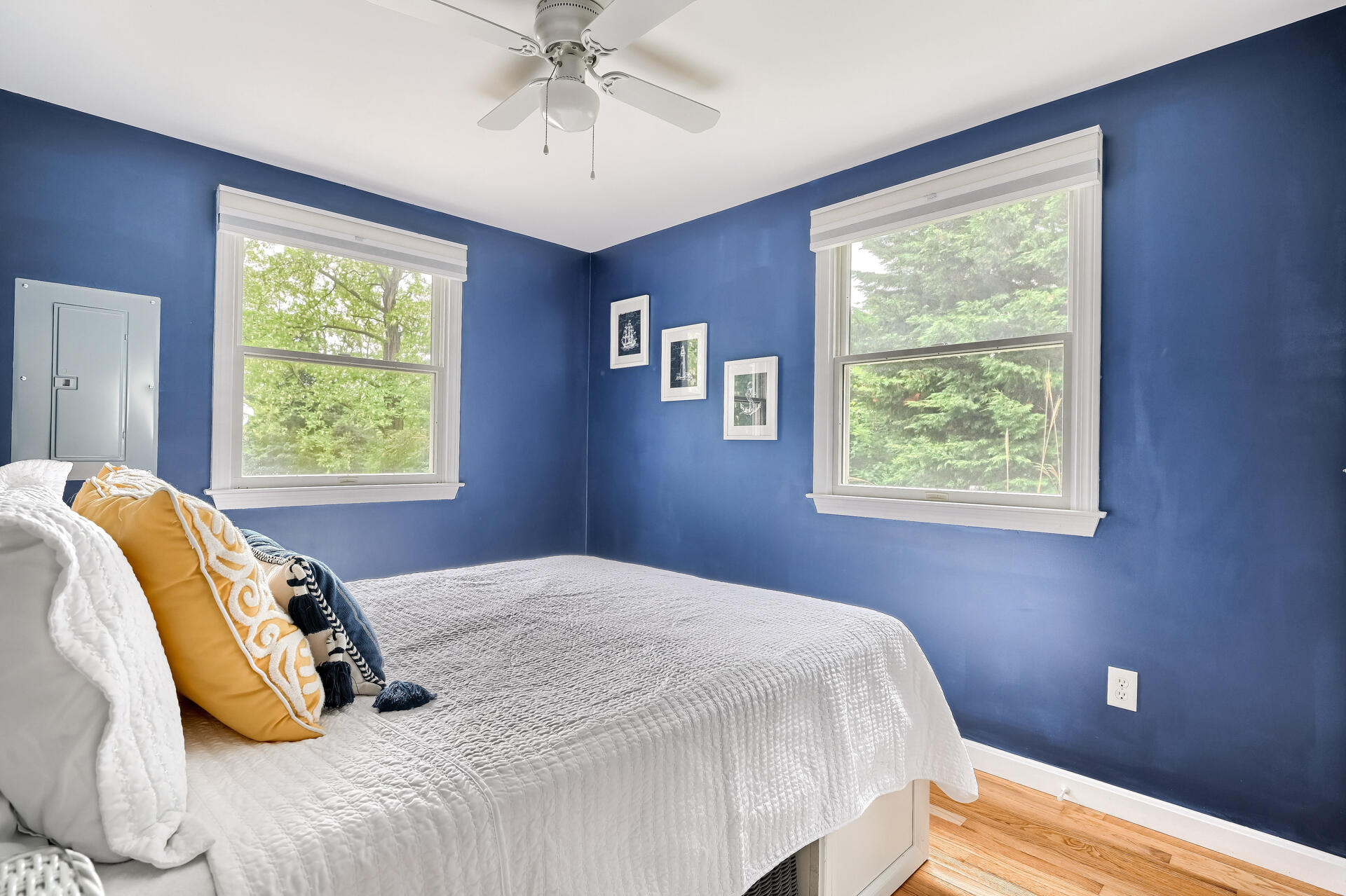 27 Locust Road, Unit 2 Eastham, MA 02642 - Photo 10 of 21 a bedroom with a bed and wooden floor