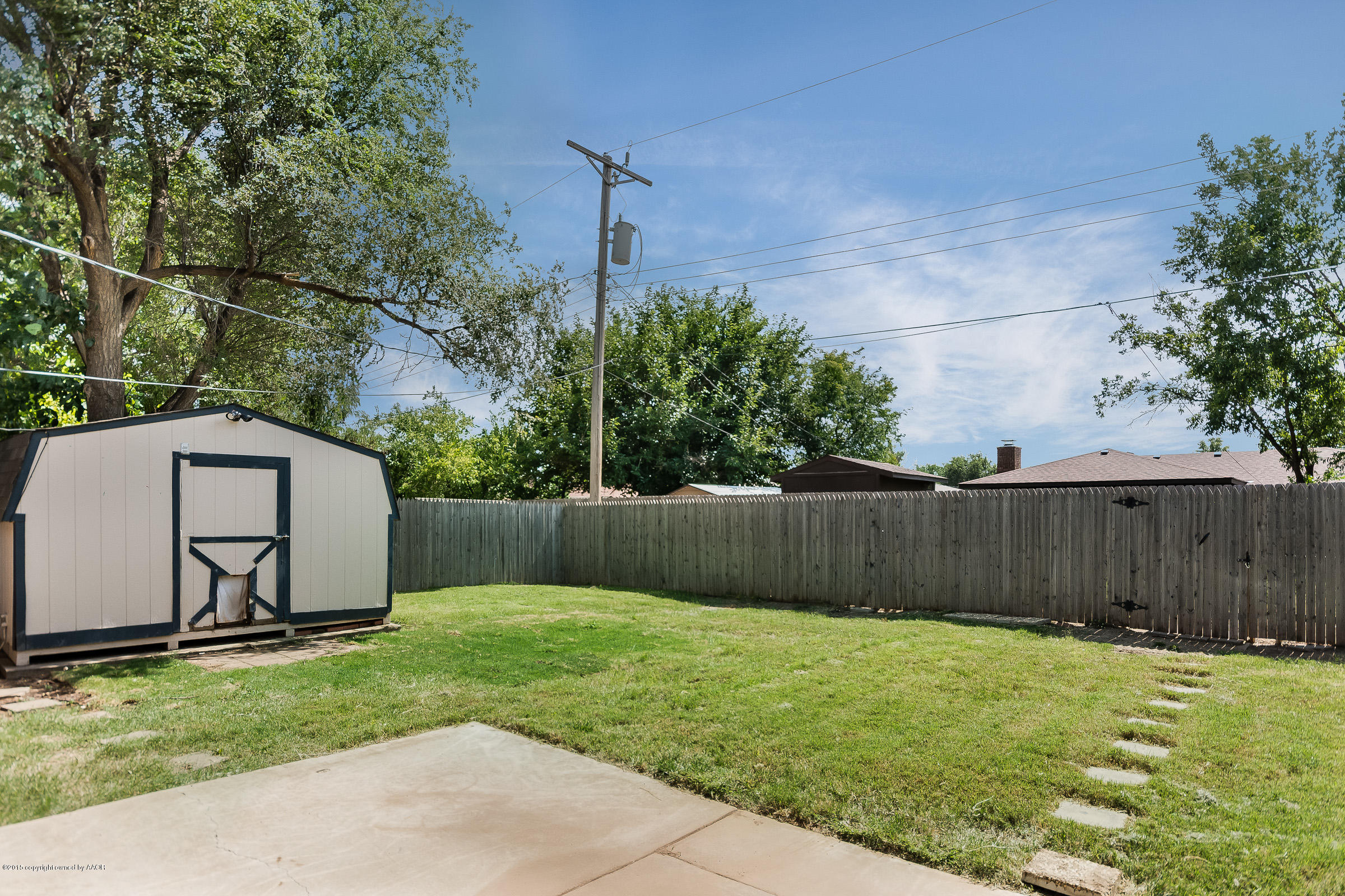 5017 Tulip Avenue Amarillo, TX 79110 - Photo 15 of 16 a view of a backyard