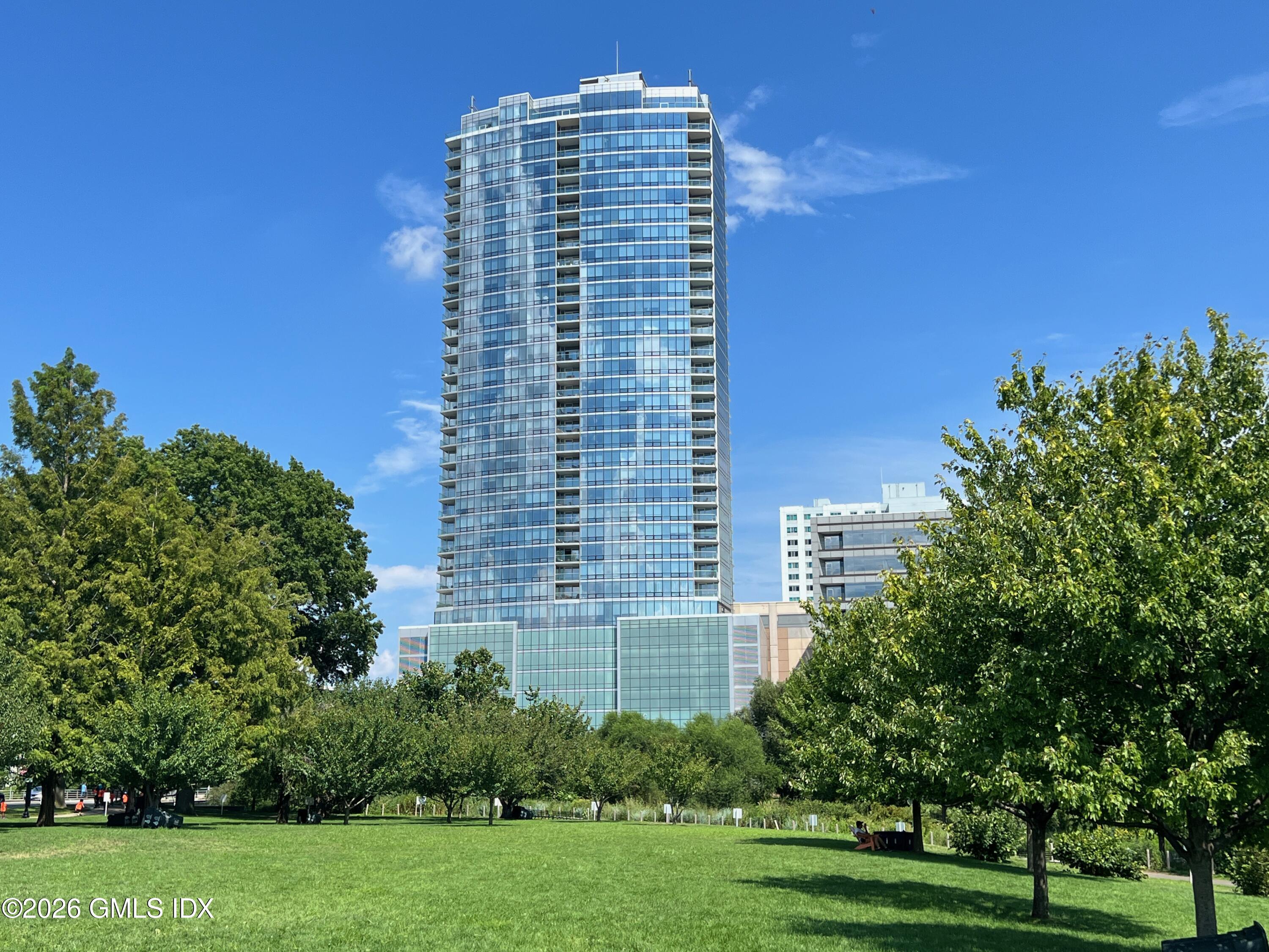 1 Broad Street, Unit PH31F Stamford, CT 06901 - Photo 1 of 13 a view of a building with a yard