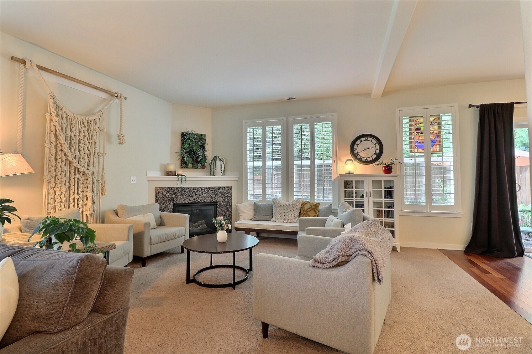 19776 Mountain Ridge Road Southeast Monroe, WA 98272 - Photo 11 of 40 a living room with furniture and a large window