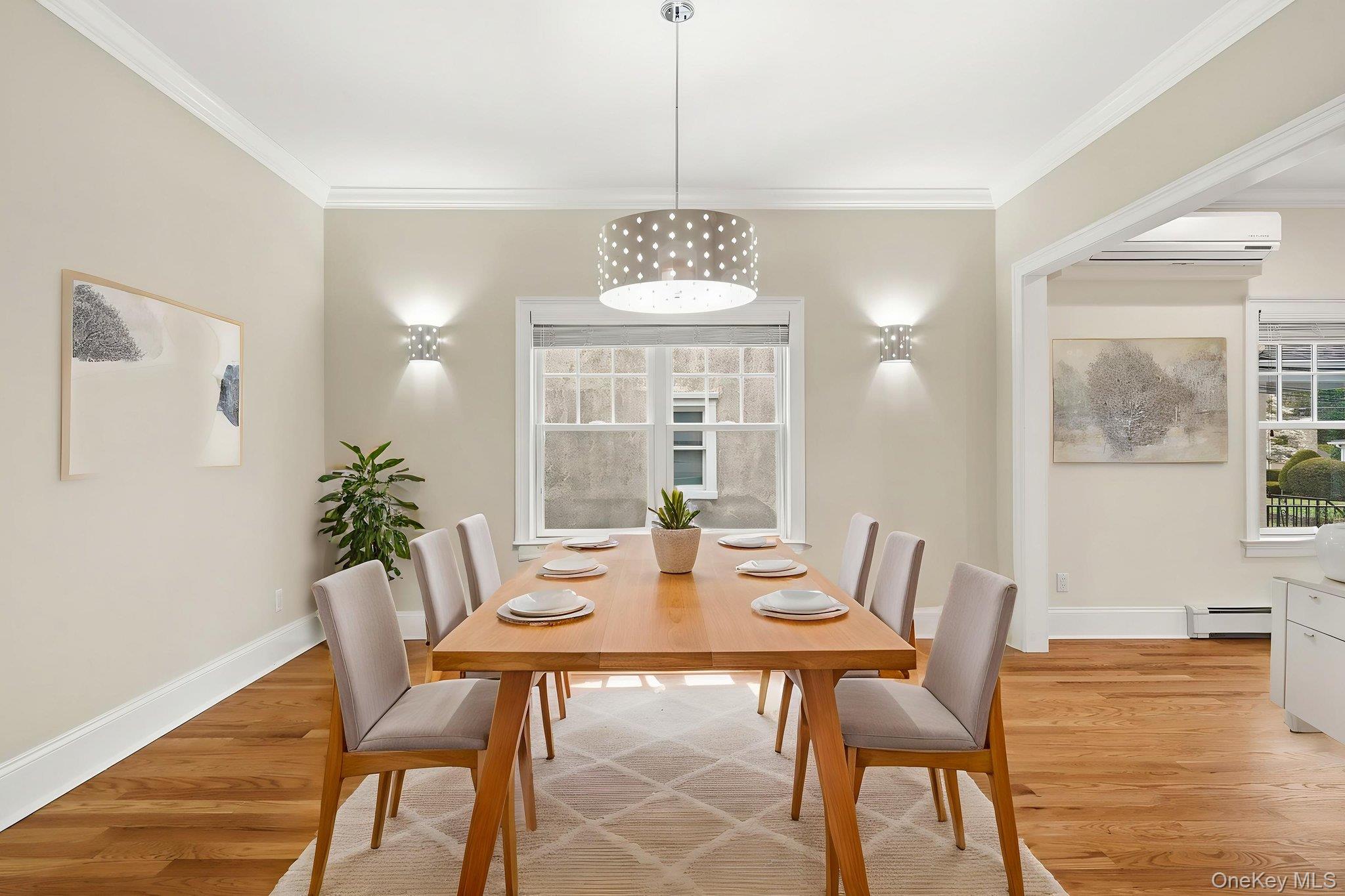 228 Central Avenue Rye, NY 10580 - Photo 5 of 24 a view of a dining room with furniture window and wooden floor