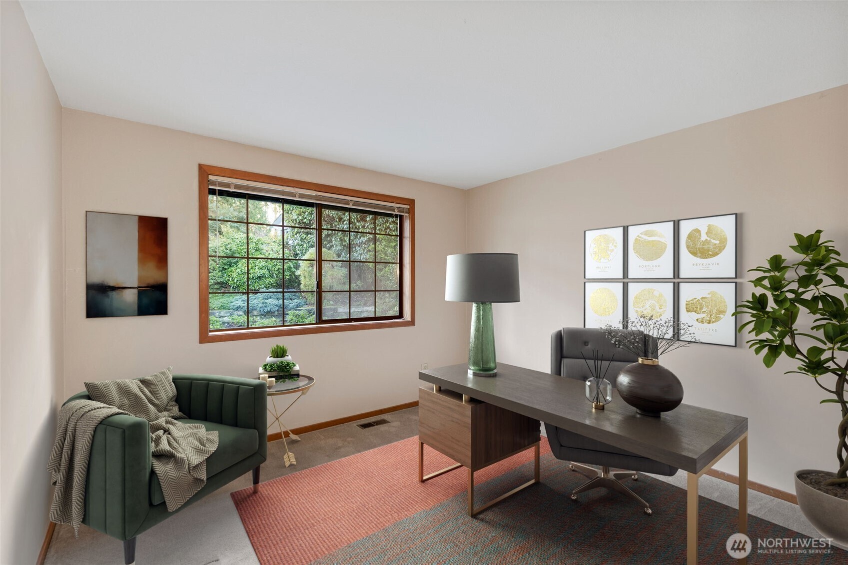 909 55th Street Port Townsend, WA 98368 - Photo 16 of 36 a livingroom with workspace and a window