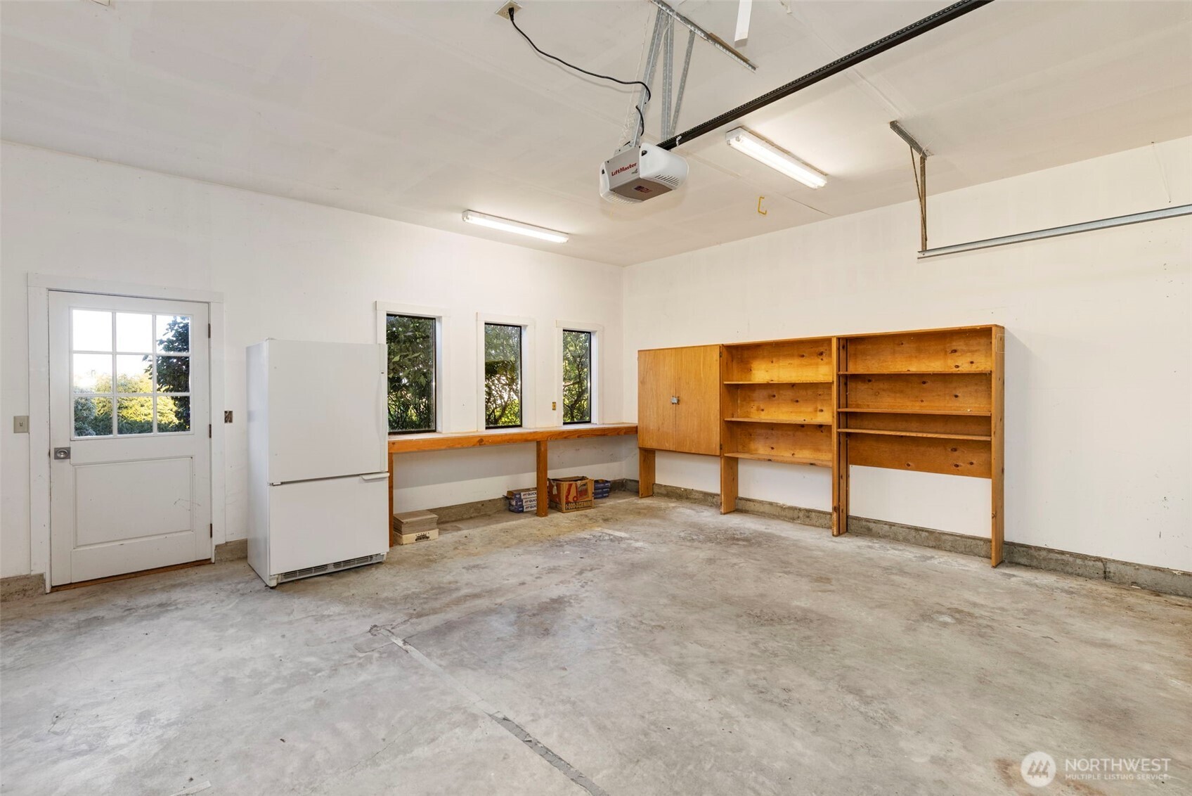909 55th Street Port Townsend, WA 98368 - Photo 20 of 36 a view of an empty room with a window